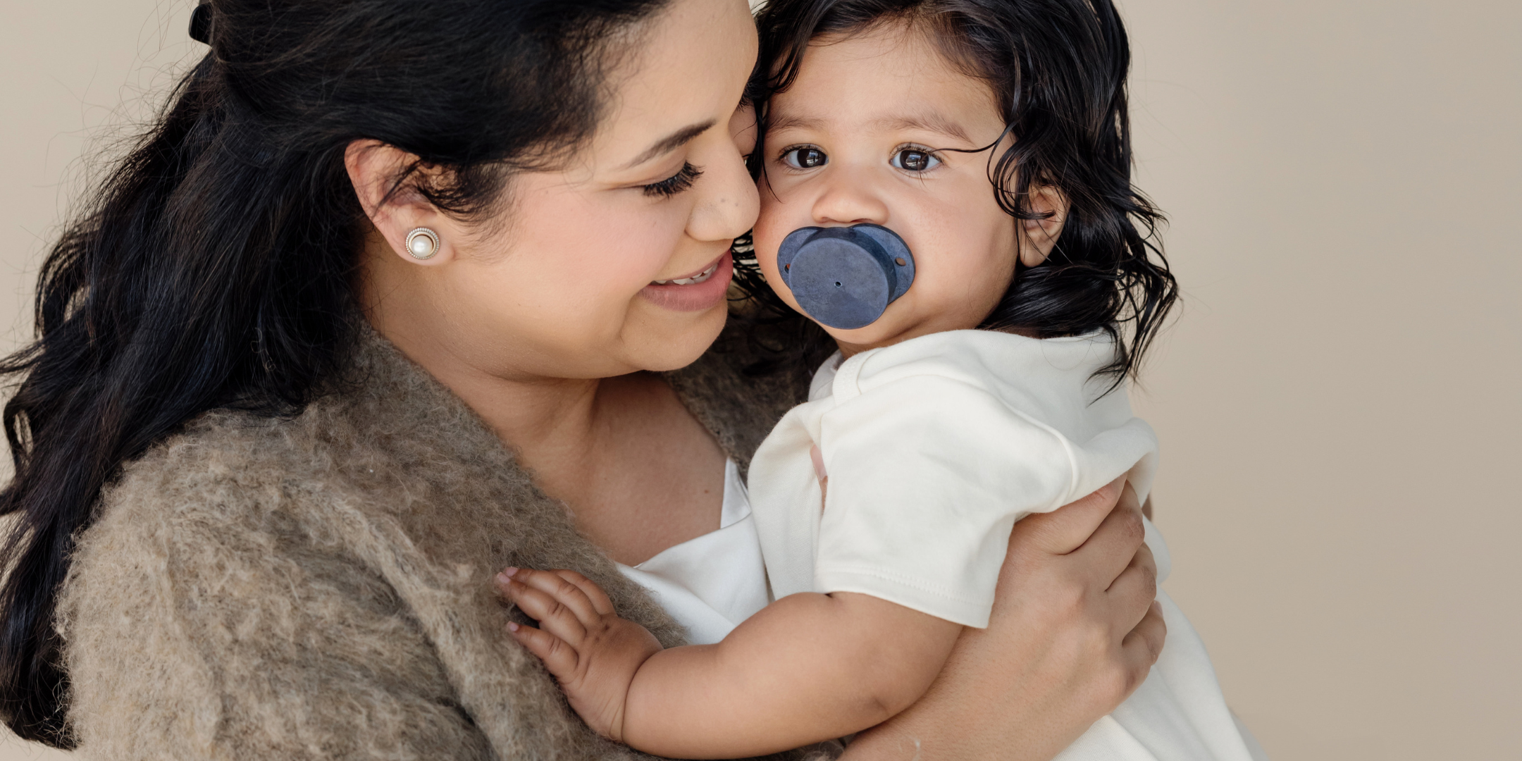Baby Won't Keep Pacifier in Mouth? 7 Real Reasons