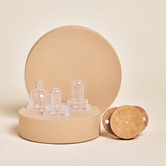 Soothe Beginnings silicone pacifier nipples with plastic free shield on neutral display