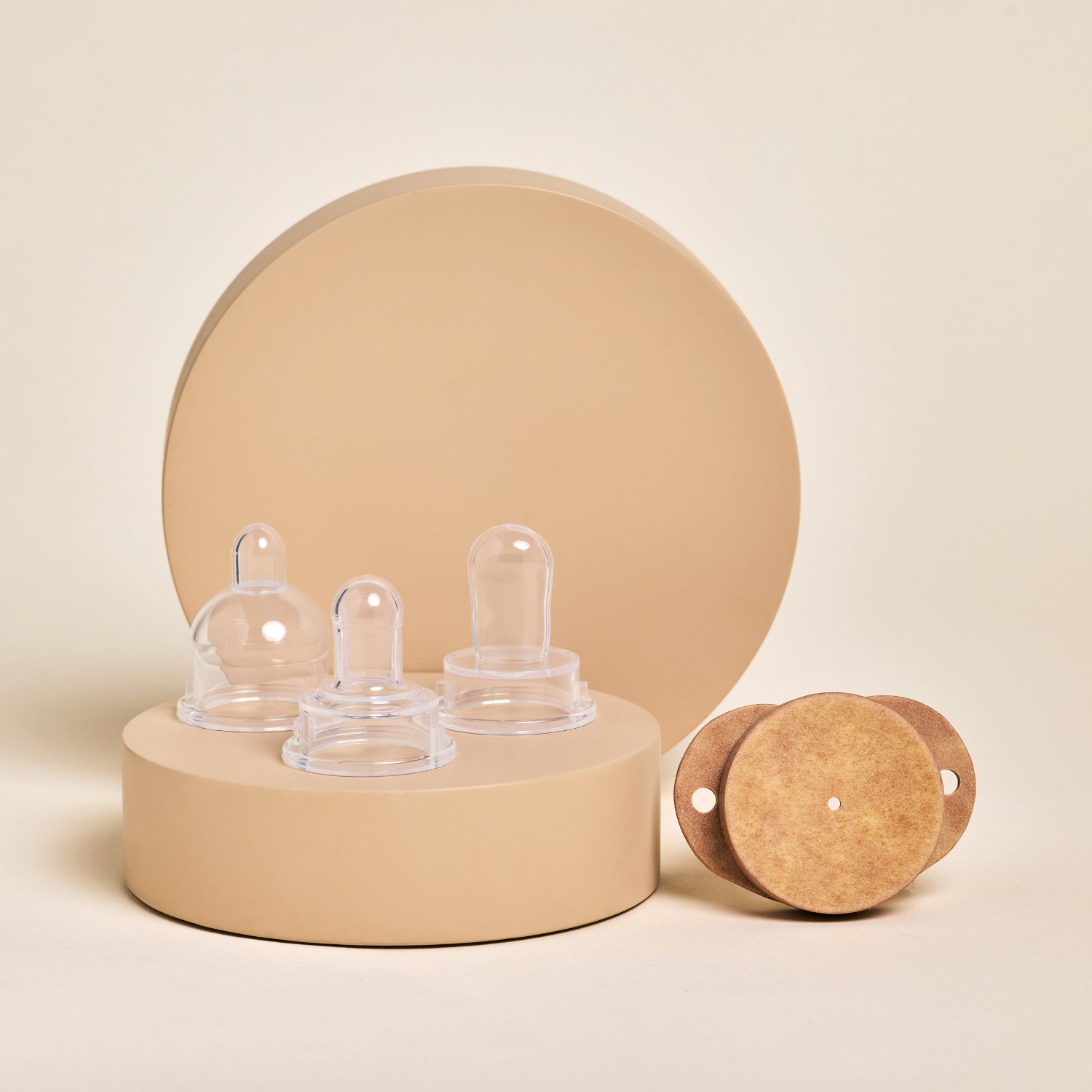 Soothe Beginnings silicone pacifier nipples with plastic free shield on neutral display